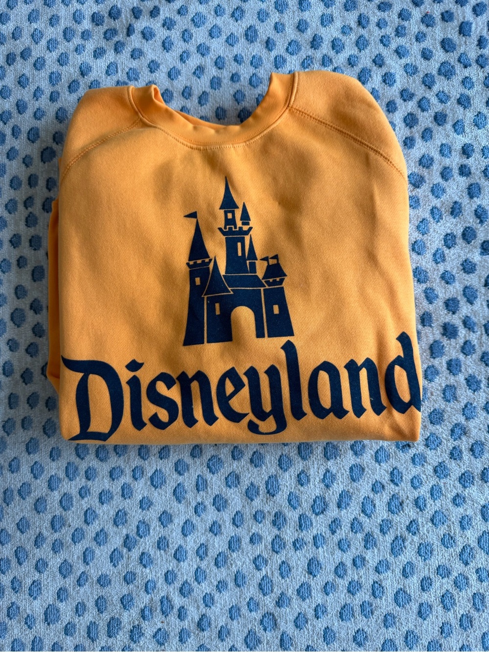 Disneyland 70th Anniversary Orange Crewneck Sweatshirt.